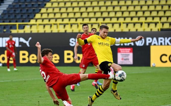 Höhepunkt des 14. Spieltages ist die Partie Borussia Dortmund gegen FC Bayern München. Foto: Federico Gambarini/dpa-Pool/dpa