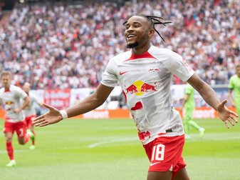 Leipzigs Christopher Nkunku jubelt, nachdem er ein Tor erzielt hat. Leipzigs Christopher Nkunku jubelt, nachdem er ein Tor erzielt hat.