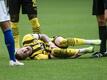 Dortmunds Marco Reus liegt während des Revierderbys verletzt am Boden.