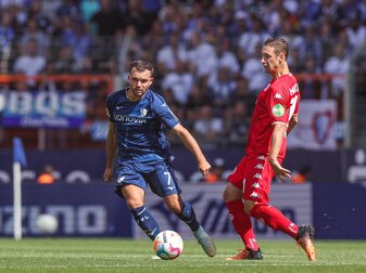 Bochums Kevin Stöger (l) im Zweikampf mit dem Mainzer Dominik Kohr. Bochums Kevin Stöger (l) im Zweikampf mit dem Mainzer Dominik Kohr.