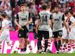 Augsburgs Elvis Rexhbecaj (l-r), Julian Baumgartlinger und Daniel Caligiuri nach der Partie gegen den 1. FC Köln.