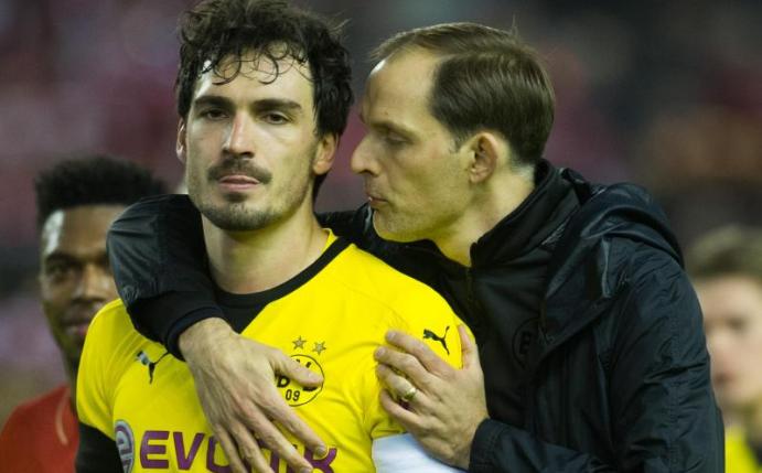 Mats Hummels (l) und Trainer Thomas Tuchel wollen nun den DFB-Pokal gewinnen. Foto: Bernd Thissen