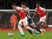 Mesut Özil (l) spielt eine starke Saison für den FC Arsenal. Foto: Sean Dempsey