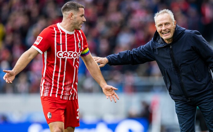 Verstehen sich: Freiburg-Kapitän Christian Günter (l) und Trainer Christian Streich.