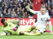 Wayne Rooney (r) und Co. besiegten Portugal. Foto: Facundo Arrizabalaga
<br>
<br>
<br>dpa-infocom GmbH
