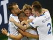 Die Isländer feiern den Treffer von Birkir Bjarnason (M) zum 1:1-Ausgleich gegen Portugal. Foto: Sergey Dolzhenko
<br>
<br>
<br>dpa-infocom GmbH