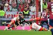 Leipzigs Konrad Laimer (r) traf gegen die Bayern zum zwischenzeitlichen 1:1.