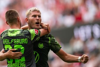 Wolfsburger Matchwinner in Köln: Jonas Wind (r). Wolfsburger Matchwinner in Köln: Jonas Wind (r).