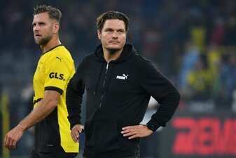 Das Debüt von Niclas Füllkrug (l., mit Dortmund-Coach Edin Terzic) beim BVB endete gegen den 1. FC Heidenheim (2:2) in einer herben Enttäuschung. Foto: UWE KRAFT / AFP via Getty Images. Das Debüt von Niclas Füllkrug (l., mit Dortmund-Coach Edin Terzic) beim BVB endete gegen den 1. FC Heidenheim (2:2) in einer herben Enttäuschung. Foto: UWE KRAFT / AFP via Getty Images.
