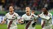 Bayer Leverkusen's Spanish defender #20 Alejandro Grimaldo (C) celebrates scoring the 2-3 goal with Bayer Leverkusen's German midfielder #07 Jonas Hofmann (L) and Bayer Leverkusen's Dutch defender #30