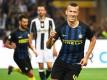 Inter Mailands Ivan Perisic (r) erzielte den 2:1-Siegtreffer Juventus Turin. Foto: Daniel Dal Zennaro