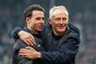 Freiburgs Nicolas Höfler (l) und Trainer Christian Streich umarmen sich.