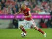 Arjen Robben tänzelt im Spiel gegen Hertha mit dem Ball über das Spielfeld. Foto: Andreas Gebert