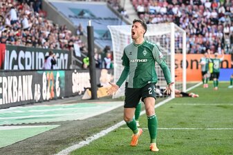 Die Bremer um Oliver Deman spielten in Augsburg in einem ungewöhnlichen Outfit. Die Bremer um Oliver Deman spielten in Augsburg in einem ungewöhnlichen Outfit.