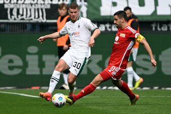 Große Bedeutung, geringe Klasse: Im Abstiegskampf teilen sich Gladbach und Union Berlin die Punkte. Große Bedeutung, geringe Klasse: Im Abstiegskampf teilen sich Gladbach und Union Berlin die Punkte.