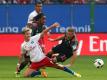 Auch Lewis Holtby ist für die Partie am Freitag fraglich. Foto: Christian Charisius