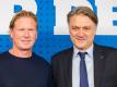 Dietmar Beiersdorfer wartet mit dem neuen Trainer Markus Gisdol (l) noch auf das erste Erfolgserlebnis. Foto: Daniel Bockwoldt