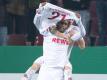 Anthony Modeste (l.) trifft auch im Pokal. Foto: Marius Becker