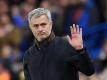 José Mourinho sezt noch auf den ehemaligen Dortmunder Henrich Mchitarjan. Foto: Andy Rain