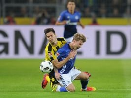 BVB und Schalke liefern sich im Derby torlosen Fight (Quelle: FIRO/SID-IMAGES) BVB und Schalke liefern sich im Derby torlosen Fight (Quelle: FIRO/SID-IMAGES)