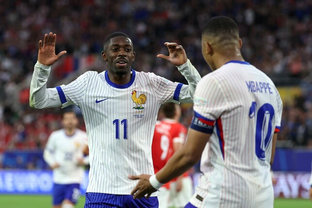 DUSSELDORF, GERMANY - JUNE 17: Kylian Mbappe of France celebrates with teammate Ousmane Dembele after Maximilian Woeber of Austria (not pictured) concedes an own goal after deflecting a cross into his