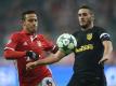 Bayerns Thiago Alcantara im Duell mit Koke (Quelle: SID)