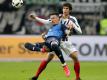 Hoffenheim-Torjäger Sandro Wagner (v) im Zweikampf mit dem Frankfurter Jesús Vallejo. Foto: Hasan Bratic
<br>dpa-infocom GmbH