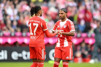 MUNICH, GERMANY - AUGUST 02: Michael Olise of Bayern Munich celebrates scoring his team's second goal with teammate Serge Gnabry during the pre-season friendly match between FC Bayern München and Oly MUNICH, GERMANY - AUGUST 02: Michael Olise of Bayern Munich celebrates scoring his team's second goal with teammate Serge Gnabry during the pre-season friendly match between FC Bayern München and Oly