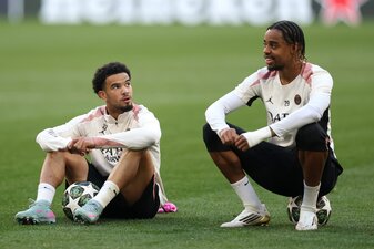 MUNICH, GERMANY - MAY 30: Warren Zaire-Emery and Bradley Barcola of Paris Saint-Germain interact during a Paris Saint-Germain training session ahead of the UEFA Champions League Final 2025 between Par MUNICH, GERMANY - MAY 30: Warren Zaire-Emery and Bradley Barcola of Paris Saint-Germain interact during a Paris Saint-Germain training session ahead of the UEFA Champions League Final 2025 between Par