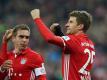 Thomas Müller (r.) bejubelt sein erstes Saisontor (Quelle: FIRO/SID)