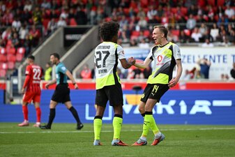 HEIDENHEIM, GERMANY - SEPTEMBER 13: Maximilian Beier of Borussia Dortmund celebrates scoring his team's second goal with teammate Karim Adeyemi during the Bundesliga match between 1. FC Heidenheim 184 HEIDENHEIM, GERMANY - SEPTEMBER 13: Maximilian Beier of Borussia Dortmund celebrates scoring his team's second goal with teammate Karim Adeyemi during the Bundesliga match between 1. FC Heidenheim 184