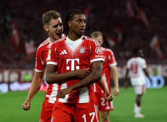 MUNICH, GERMANY - AUGUST 22: Michael Olise of Bayern Munich celebrates scoring his team's first goal with teammate Josip Stanisic during the Bundesliga match between FC Bayern München and RB Leipzig MUNICH, GERMANY - AUGUST 22: Michael Olise of Bayern Munich celebrates scoring his team's first goal with teammate Josip Stanisic during the Bundesliga match between FC Bayern München and RB Leipzig