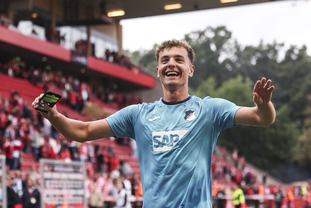 BERLIN, GERMANY - SEPTEMBER 13: Fisnik Asllani of TSG Hoffenheim shows appreciation to the fans after the Bundesliga match between 1. FC Union Berlin and TSG Hoffenheim at Stadion An der Alten Foerste
