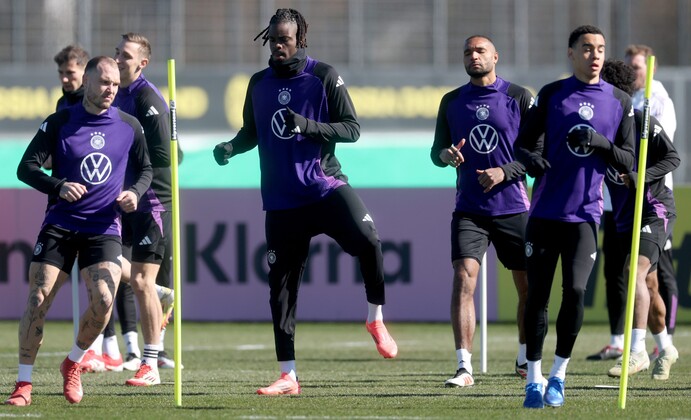 DORTMUND, GERMANY - MARCH 18: Yann-Aurel Bisseck warms up during a Germany training session at Borussia Dortmund training ground on March 18, 2025 in Dortmund, Germany. (Photo by Lars Baron/Getty Imag