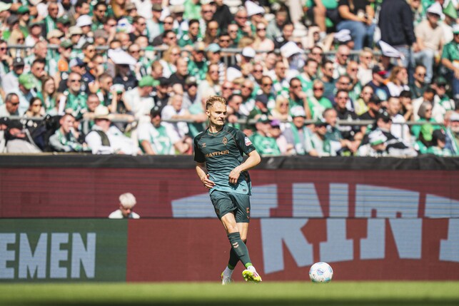 BREMEN, GERMANY - MAY 10: Amos Pieper of SV Werder Bremen passes the ball during the Bundesliga match between SV Werder Bremen and RB Leipzig at Weserstadion on May 10, 2025 in Bremen, Germany. (Photo