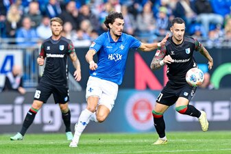 Viel Mittelfeld-Kampf beim Zweitliga-Duell in Darmstadt. Viel Mittelfeld-Kampf beim Zweitliga-Duell in Darmstadt.