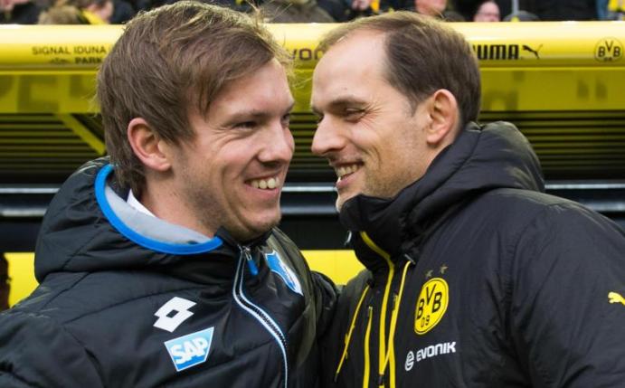Dortmunds Trainer Thomas Tuchel (r) und Trainer Julian Nagelsmann von Hoffenheim. Foto: Bernd Thissen