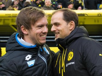 Dortmunds Trainer Thomas Tuchel (r) und Trainer Julian Nagelsmann von Hoffenheim. Foto: Bernd Thissen Dortmunds Trainer Thomas Tuchel (r) und Trainer Julian Nagelsmann von Hoffenheim. Foto: Bernd Thissen