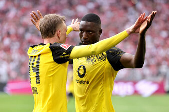 DORTMUND, GERMANY - AUGUST 31: Serhou Guirassy of Borussia Dortmund celebrates scoring his team's first goal with team mate Maximilian Beier during the Bundesliga match between Borussia Dortmund and 1 DORTMUND, GERMANY - AUGUST 31: Serhou Guirassy of Borussia Dortmund celebrates scoring his team's first goal with team mate Maximilian Beier during the Bundesliga match between Borussia Dortmund and 1