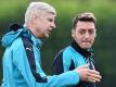 Trainer Arsène Wenger hat Mesut Özil zum FC Arsenal geholt. Foto: Andy Rain