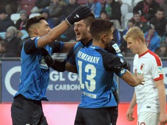 Jubelnde Hoffenheimer: Nadiem Amiri (l-r), Andrej Kramaric und Kerem Demirbay. Foto: Stefan Puchner Jubelnde Hoffenheimer: Nadiem Amiri (l-r), Andrej Kramaric und Kerem Demirbay. Foto: Stefan Puchner