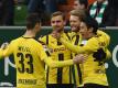 Andre Schürrle (2.v.r.) wird von den Teamkameraden für seinen Treffer zum 1:0 für Dortmund gefeiert. Foto: Carmen Jaspersen