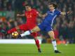 Chelseas David Luiz (r.) im Duell mit Roberto Firmino. Foto: Dave Thompson