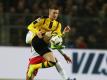 Der Einsatz von Marco Reus gegen Darmstadt ist fraglich. Foto: Ina Fassbender