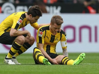 Marco Reus musste mit Schmerzen im Oberschenkel gegen Leverkusen ausgewechselt werden. Foto: Friso Gentsch Marco Reus musste mit Schmerzen im Oberschenkel gegen Leverkusen ausgewechselt werden. Foto: Friso Gentsch