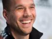 Lukas Podolski freut sich auf seinen ersten und letzten Einsatz als DFB-Kapitän. Foto: Marius Becker