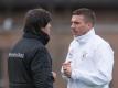 Bundestrainer Joachim Löw (l) wird beim Spiel gegen England das letzte Mal mit Lukas Podolski zusammenarbeiten. Foto: Bernd Thissen