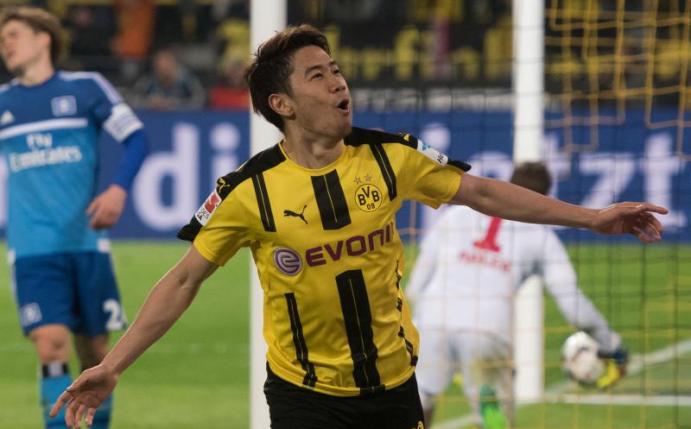 Dortmunds Shinji Kagawa jubelt über seinen Treffer zum 2:0. Foto: Bernd Thissen