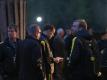 BVB-Trainer Thomas Tuchel (M) steht nach der Attacke auf den Bus mit seinem Team beisammen. Foto: Ina Fassbender