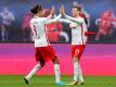 «Der eine springt hoch wie ein Pferd, der eine rennt schnell wie ein Pferd.» Freiburgs Stürmer Nils Petersen zu den Leipzigern Yussuf Poulsen (l) und Timo Werner. Foto: Jan Woitas